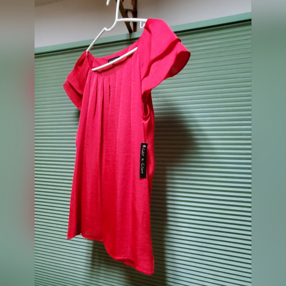 Women's 100% polyester shirt with cap sleeves.  Red, size1X
